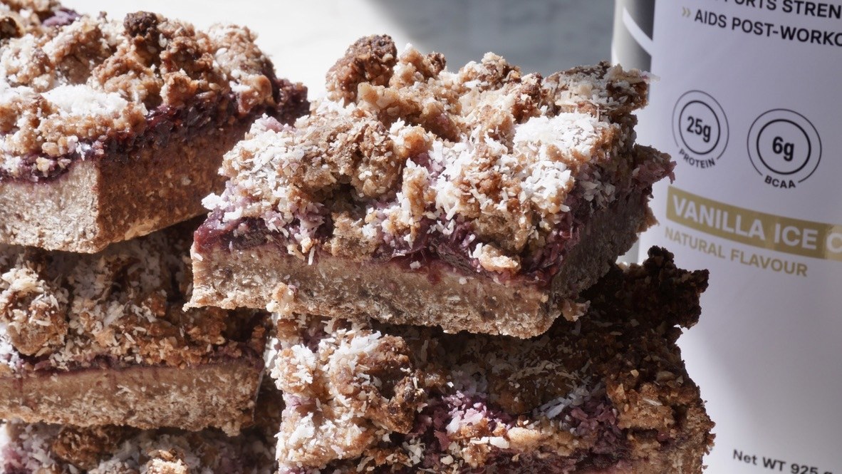 Cherry, Vanilla and Coconut Oat Slice, made with AlphaFit supplements