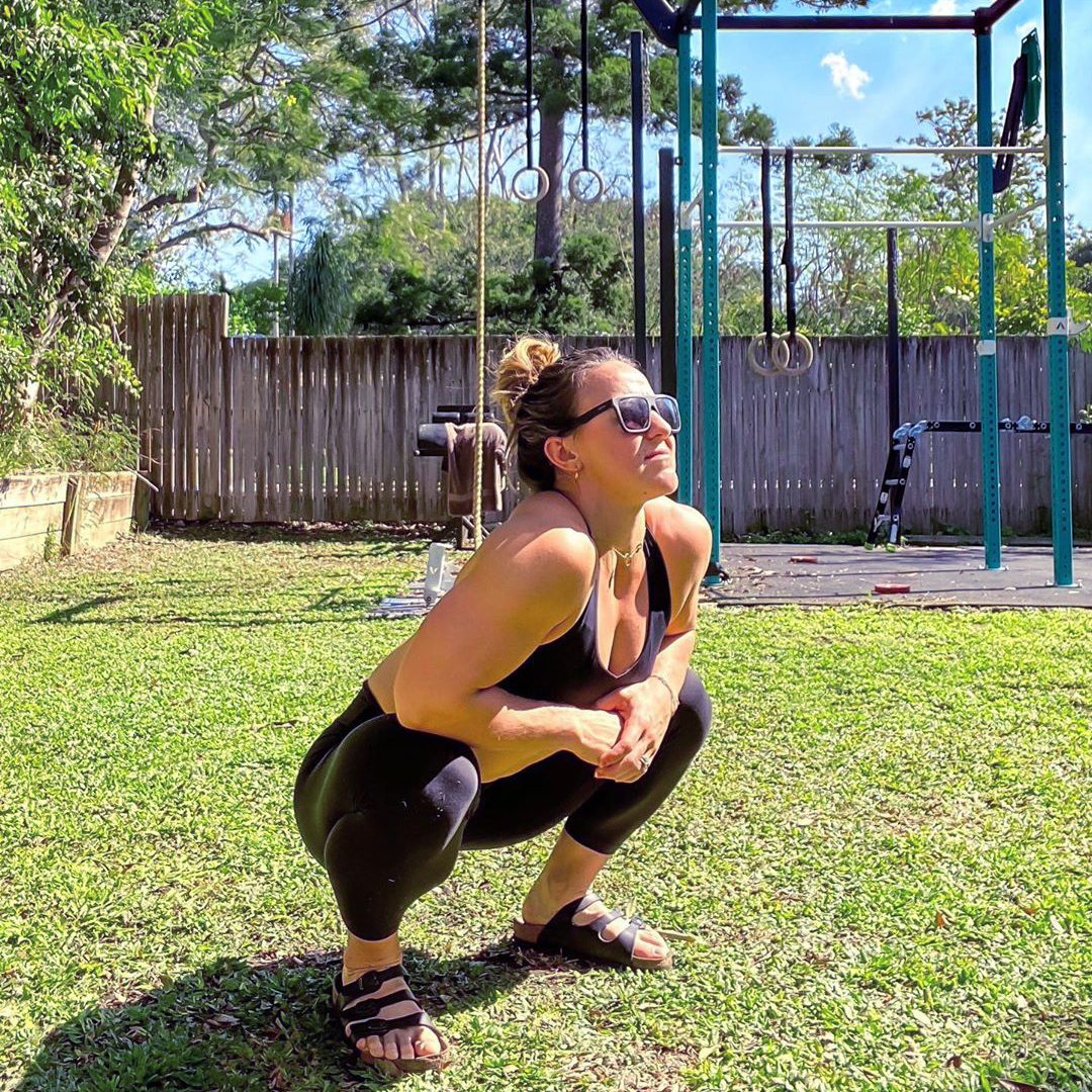 Kara Saunders ROMWOD squatting